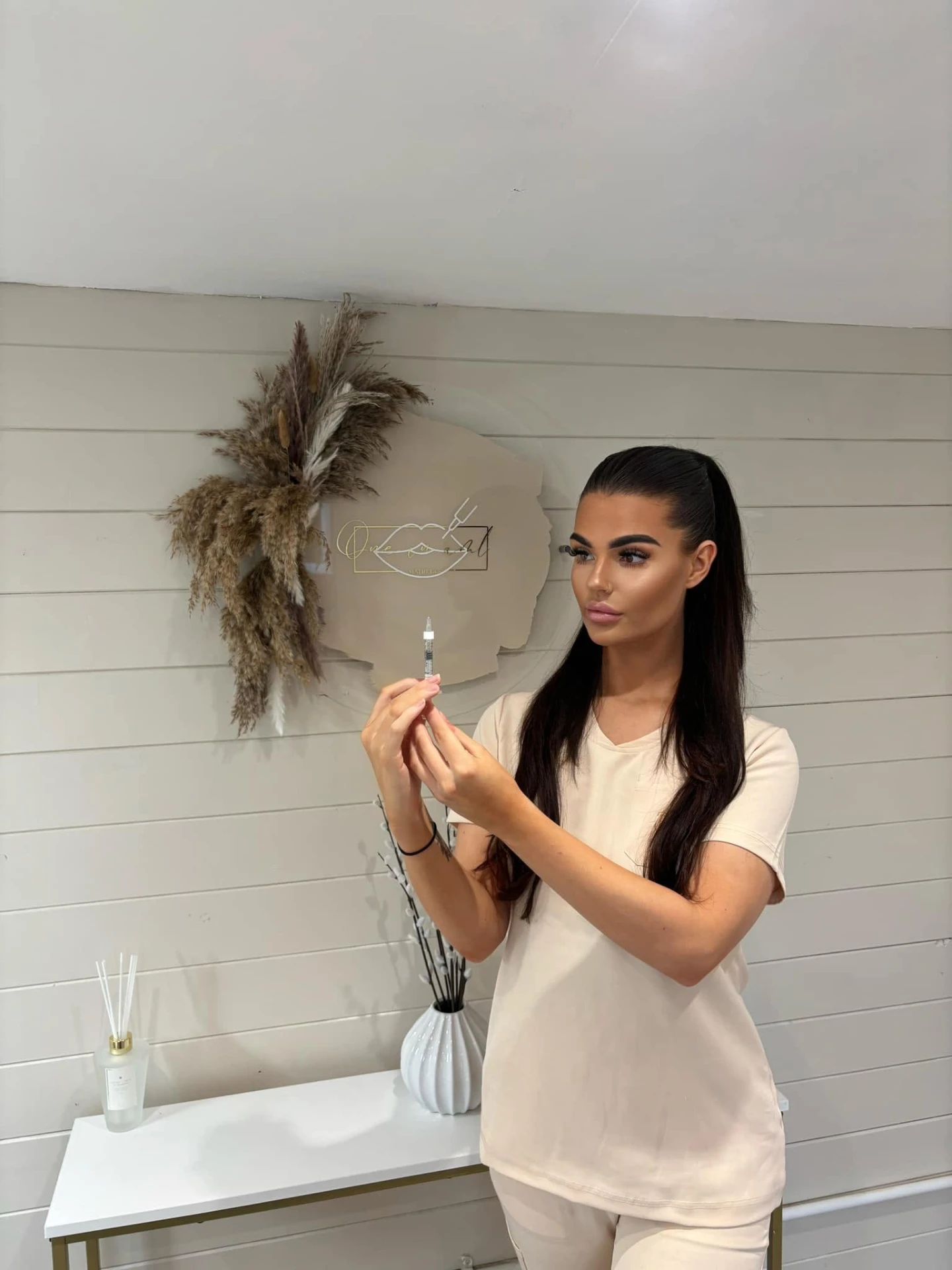 Amber, Advanced Medical Practitioner, preparing a treatment at One in a ML Aesthetics